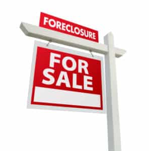 Foreclosure For Sale Real Estate Sign Isolated on White.